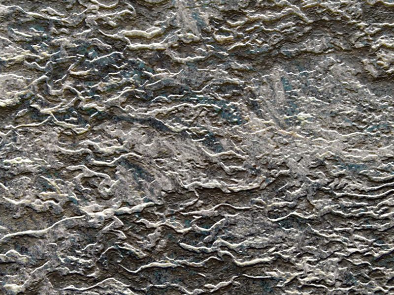 Texture example: rough, layered rock surface.