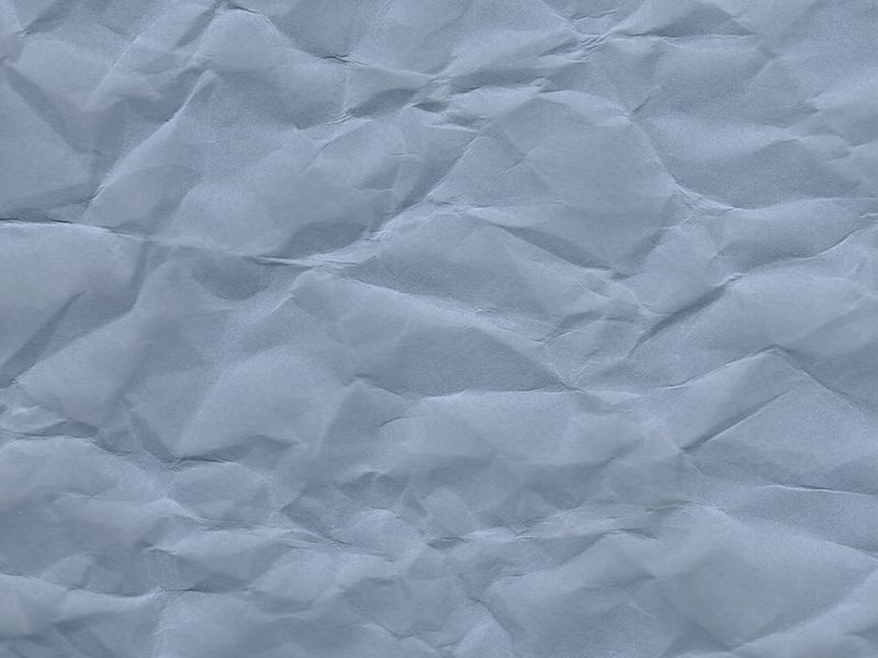Texture example: crumpled pale blue paper.